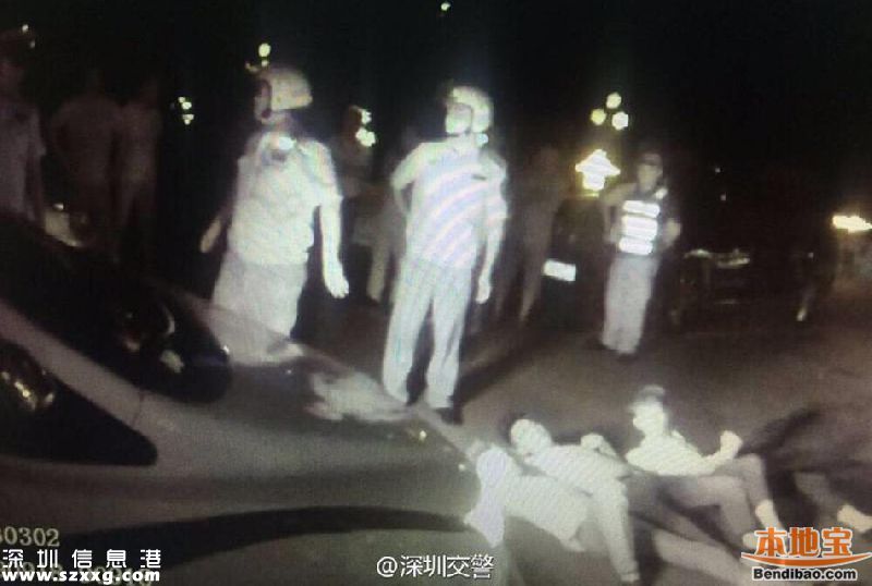 深圳查酒驾现奇葩 朋友被抓4人躺地拦警车(组图)